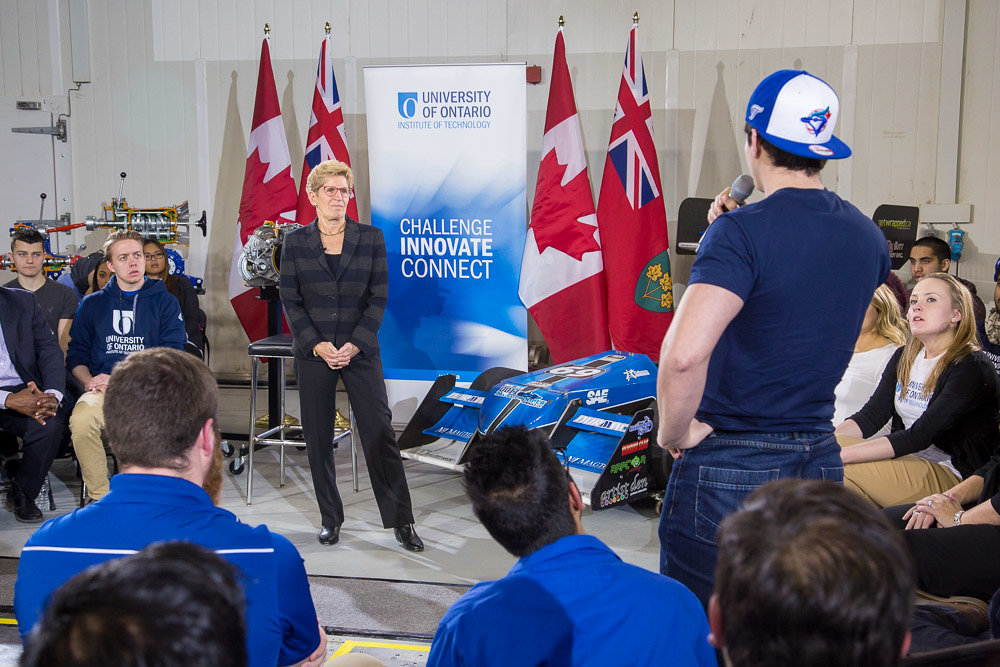 Premier Wynne takes questions from students during a round table session in the ACE Climatic Wind Tunnel.